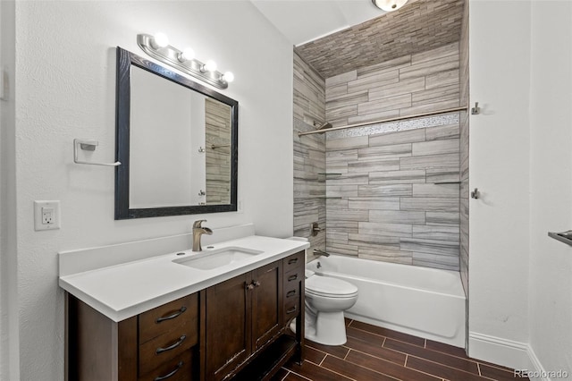 613 Pine St, Boulder, CO 80302 - full bathroom with baseboards, wood finish floors, toilet, shower / bathing tub combination, and vanity