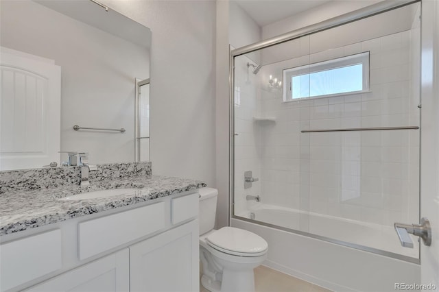 241 N Front St Unit 103, Monument, CO 80132 - full bathroom with toilet, vanity, and combined bath / shower with glass door