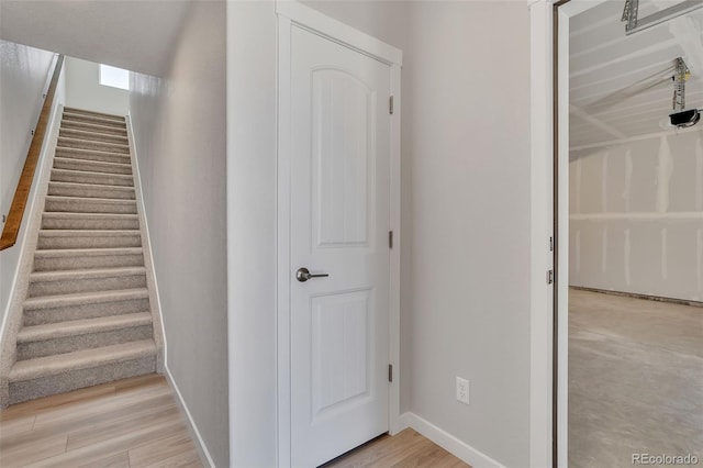 241 N Front St Unit 103, Monument, CO 80132 - stairway with baseboards and wood finished floors