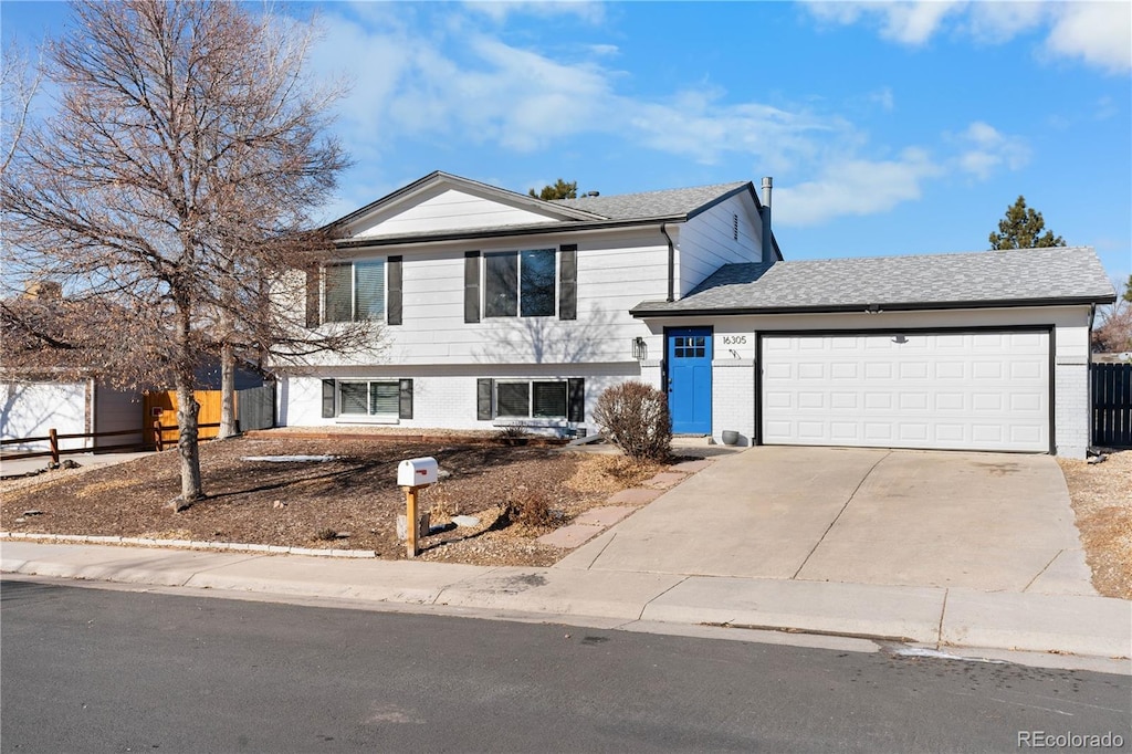 view of front of property with a garage