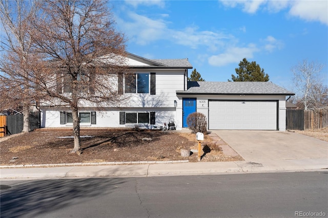 split level home featuring a garage