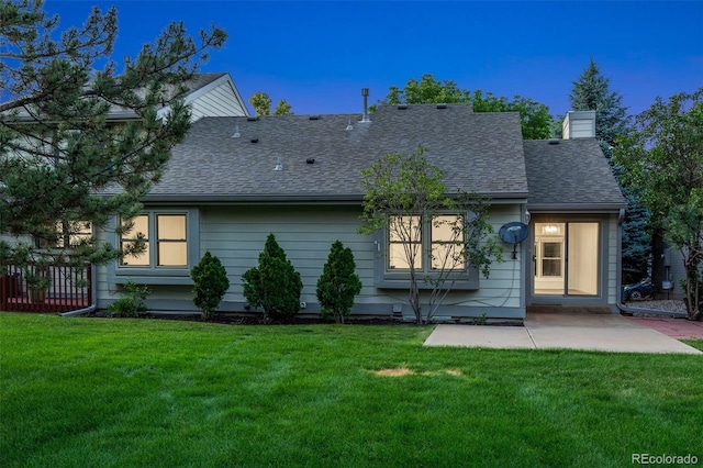1460 Front Nine Dr Unit A, Fort Collins, CO 80525 - back of house featuring a shingled roof, a chimney, and a patio area