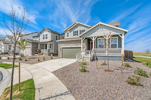 view of front of house with covered porch and a garage