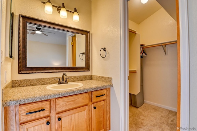 bathroom with vanity and ceiling fan