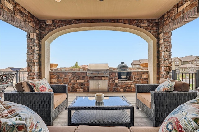 view of patio / terrace featuring an outdoor living space, a grill, and area for grilling