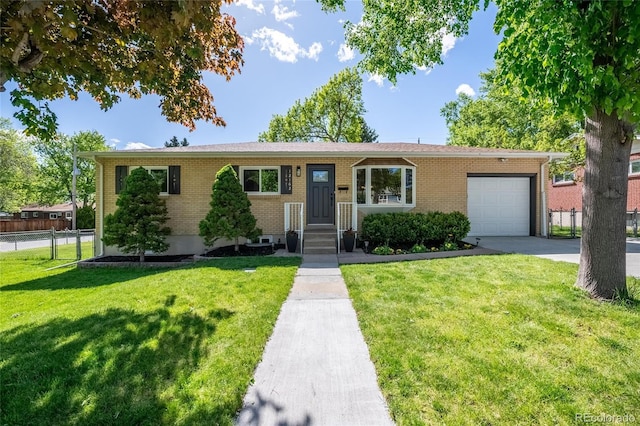 12162 W Dakota Dr, Lakewood, CO 80228 - ranch-style house featuring brick siding, driveway, and a garage