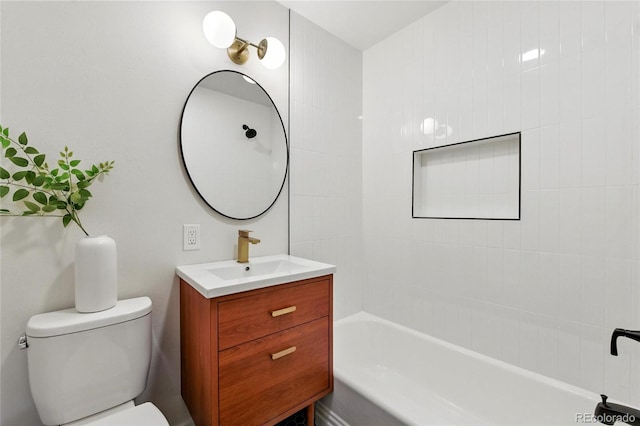 12162 W Dakota Dr, Lakewood, CO 80228 - bathroom featuring toilet, vanity, and  shower combination