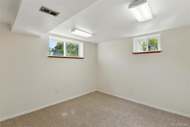 12162 W Dakota Dr, Lakewood, CO 80228 - basement with carpet, plenty of natural light, and baseboards