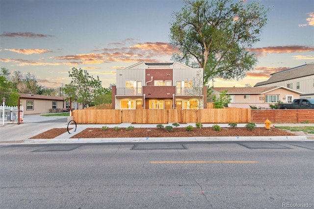 1046 N Knox Ct, Denver, CO 80204 - townhome / multi-family property with a balcony