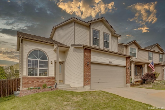 6041 Pioneer Mesa Dr, Colorado Springs, CO 80923 - view of front facade featuring brick siding, driveway, a garage, and entry steps