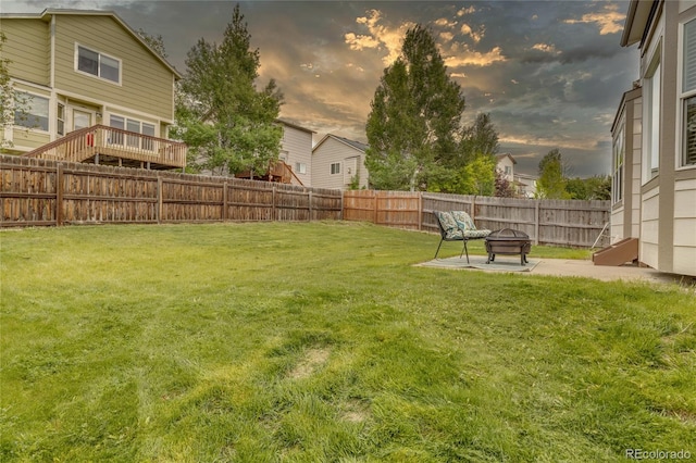 6041 Pioneer Mesa Dr, Colorado Springs, CO 80923 - yard at dusk with a fire pit and a patio area