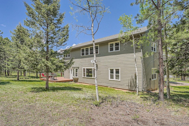 33 Sparrow Ct, Bailey, CO 80421 - back of house with a deck and a yard