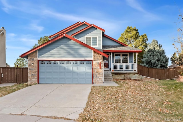 view of front of house featuring a garage and covered porch