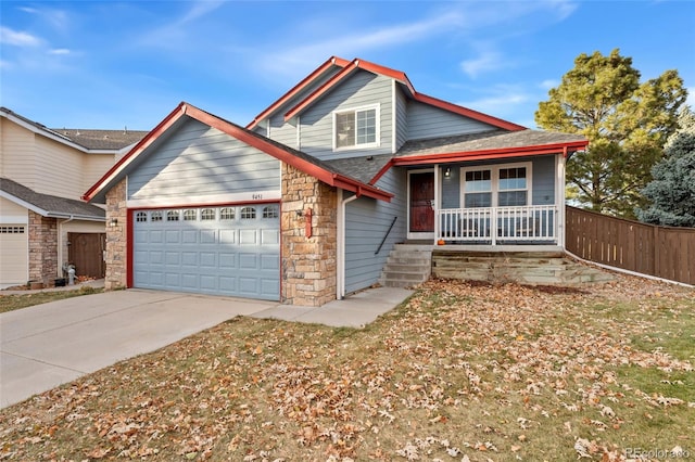 view of front of home with a porch and a garage