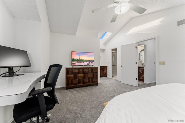 carpeted bedroom with ceiling fan, a textured ceiling, and vaulted ceiling