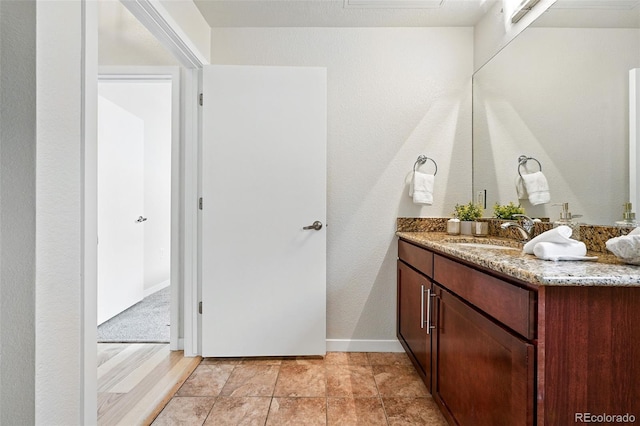 2518 16th St, Denver, CO 80211 - bathroom featuring vanity and baseboards