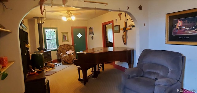 miscellaneous room featuring carpet flooring and ceiling fan