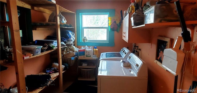 storage room with washing machine and clothes dryer