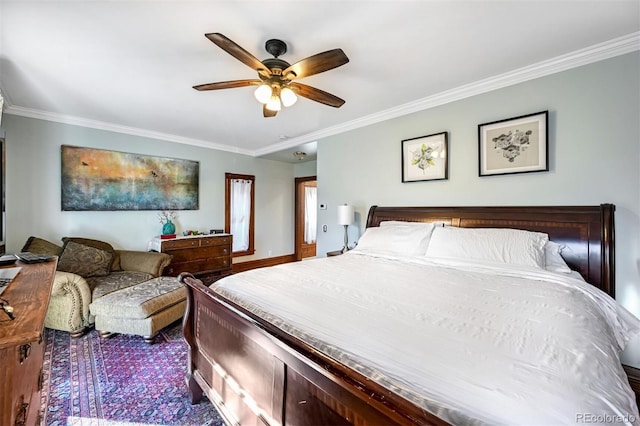 bedroom featuring crown molding and ceiling fan