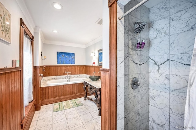 bathroom with independent shower and bath and crown molding