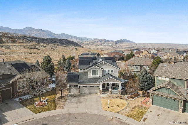 bird's eye view with a residential view and a mountain view