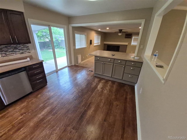 1962 S Ivory Way, Aurora, CO 80013 - kitchen featuring stainless steel dishwasher, a ceiling fan, dark wood-style floors, and light countertops