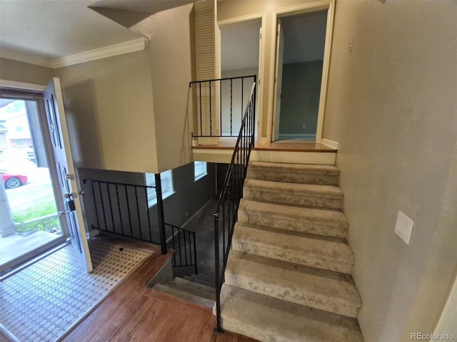 1962 S Ivory Way, Aurora, CO 80013 - staircase with wood finished floors and crown molding