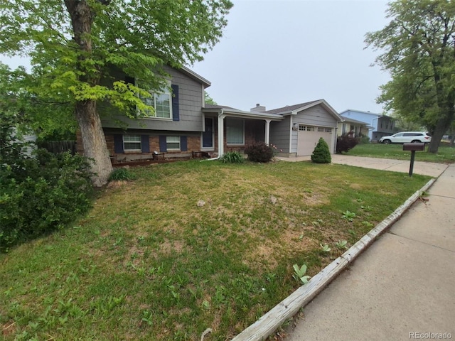 1962 S Ivory Way, Aurora, CO 80013 - split level home with driveway, a garage, a front lawn, and brick siding