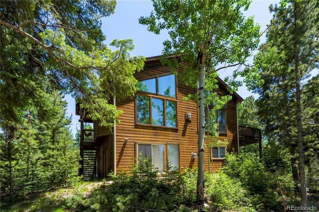 11526 Green Cir, Conifer, CO 80433 - view of home's exterior featuring stairs
