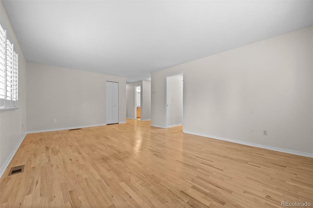 888 E Davies Ave, Centennial, CO 80122 - unfurnished room featuring light wood finished floors and baseboards