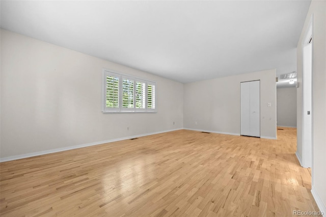 888 E Davies Ave, Centennial, CO 80122 - unfurnished bedroom with light wood-style flooring and baseboards