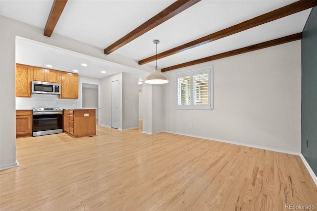 888 E Davies Ave, Centennial, CO 80122 - kitchen featuring appliances with stainless steel finishes, open floor plan, beamed ceiling, light countertops, and light wood-style floors