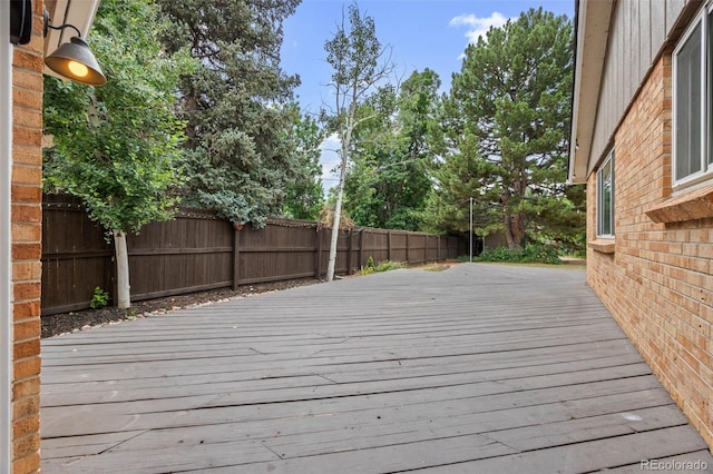 888 E Davies Ave, Centennial, CO 80122 - wooden deck with a fenced backyard