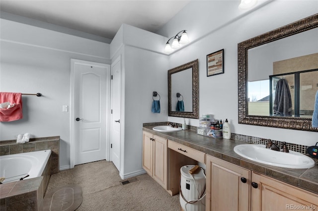 bathroom with vanity and plus walk in shower