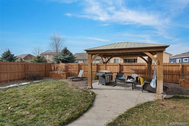 view of patio featuring area for grilling and a gazebo