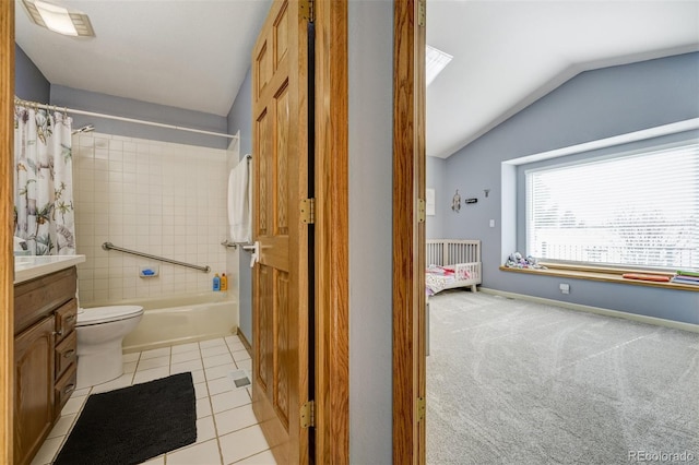 full bathroom featuring lofted ceiling, shower / bathtub combination with curtain, vanity, tile patterned floors, and toilet