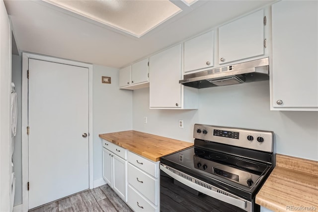 kitchen with electric stove, light wood-style floors, white cabinetry, and under cabinet range hood