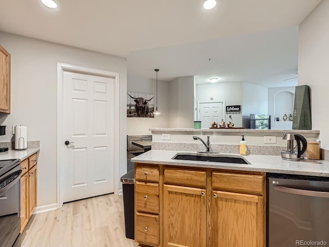5755 N Genoa Way Unit 14-105, Aurora, CO 80019 - kitchen featuring appliances with stainless steel finishes, light wood-style floors, recessed lighting, and light stone countertops