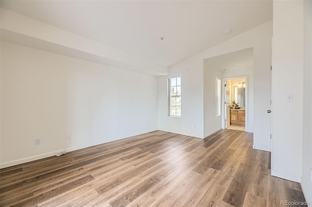 empty room featuring wood finished floors