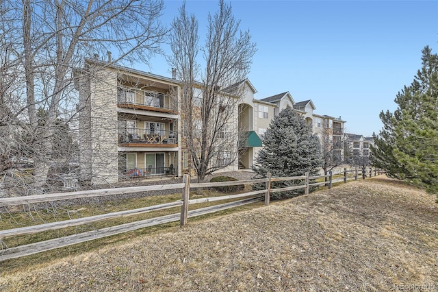 view of property with a fenced front yard