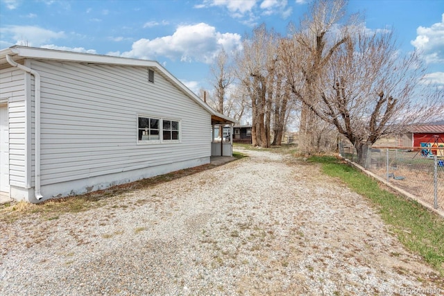 8005 W US Highway 50, Salida, CO 81201 - view of side of home featuring fence