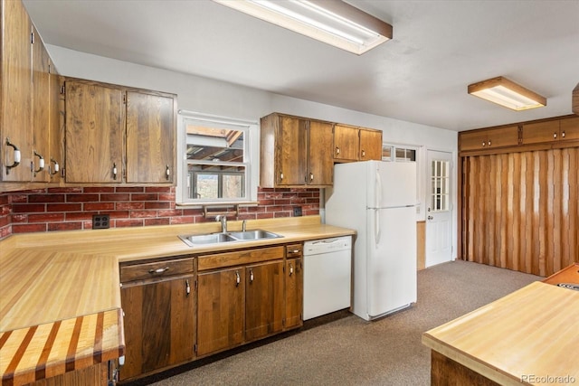 8005 W US Highway 50, Salida, CO 81201 - kitchen with white appliances, a sink, light countertops, and dark colored carpet