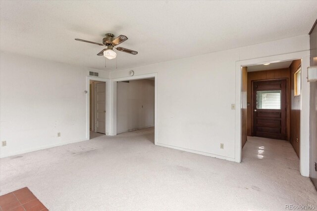 8005 W US Highway 50, Salida, CO 81201 - unfurnished bedroom with light carpet, a closet, baseboards, and ceiling fan