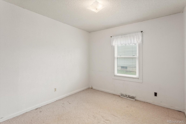 8005 W US Highway 50, Salida, CO 81201 - carpeted empty room featuring baseboards and a textured ceiling