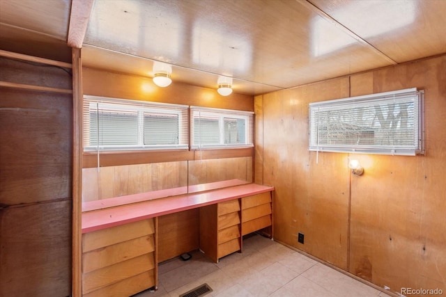 8005 W US Highway 50, Salida, CO 81201 - unfurnished office featuring light tile patterned floors and wooden walls