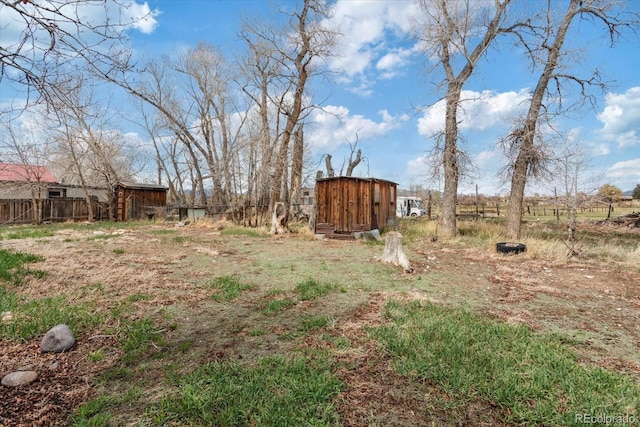 8005 W US Highway 50, Salida, CO 81201 - view of yard with fence, an outdoor structure, and a storage unit