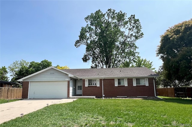 820 Cottonwood Ave, Centennial, CO 80121 - single story home with concrete driveway, an attached garage, and brick siding