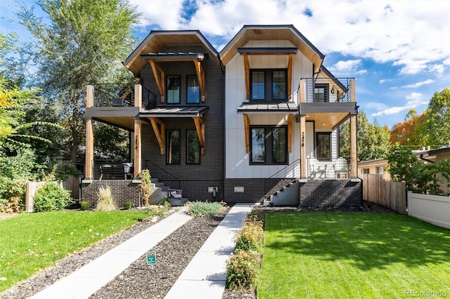 contemporary house with a front yard and a balcony