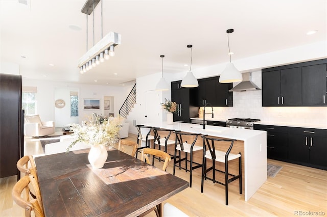 dining space featuring light wood-type flooring