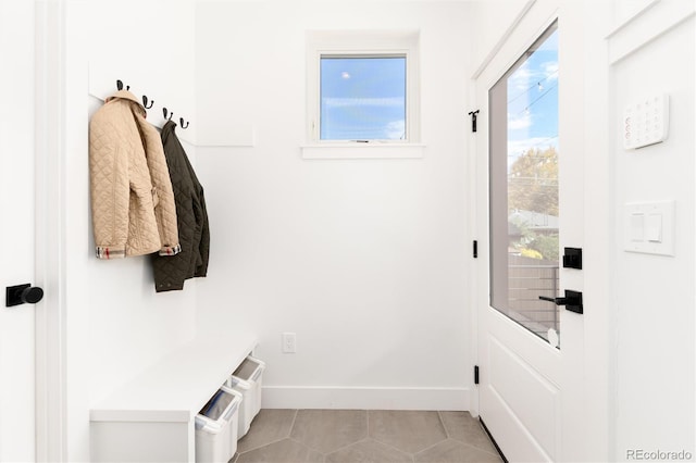 mudroom with light tile patterned floors